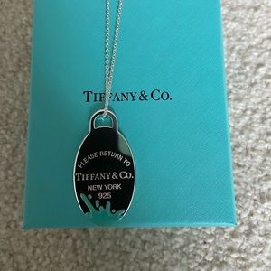Oval tag charm with blue splash, with 28-30’ adjustable beaded chain